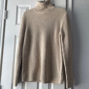 Tan winter turtle neck.